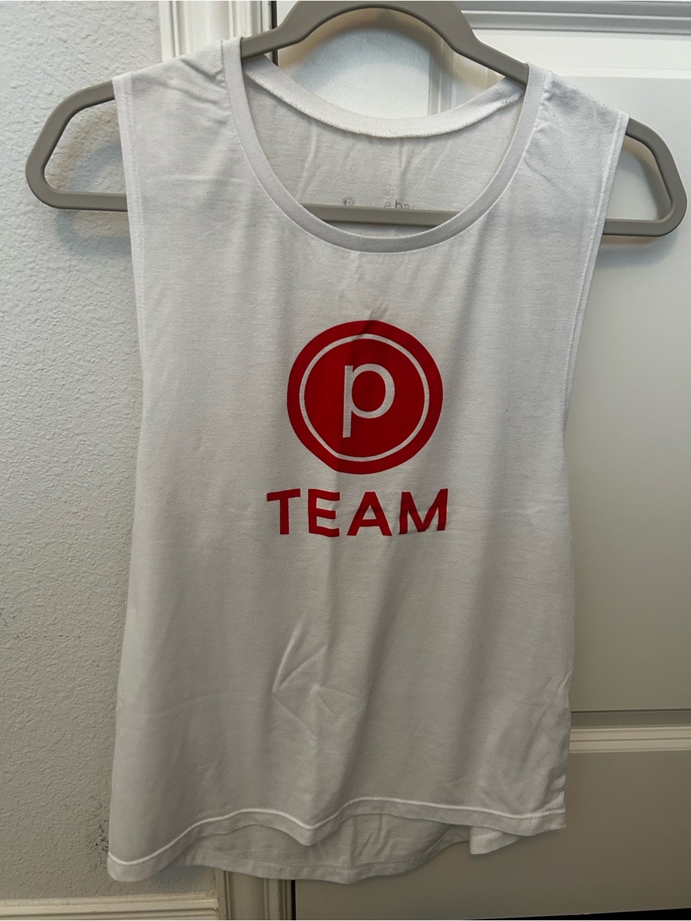 Pure Barre White Tank Top with Red Team Logo